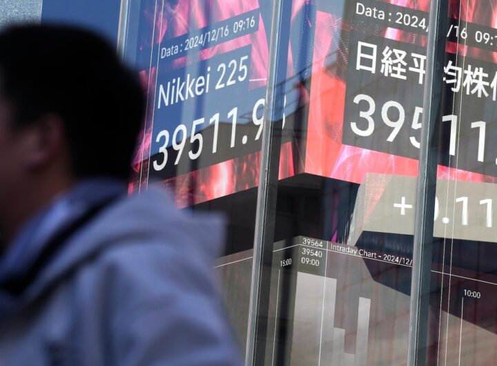 Stock market today: Asian shares are mixed after Nasdaq sets a record ahead of Fed meeting